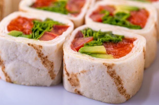 Lavash roll with tomatoes and herbs