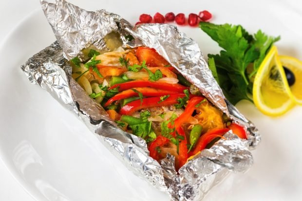 Mintay with vegetables and herbs in foil