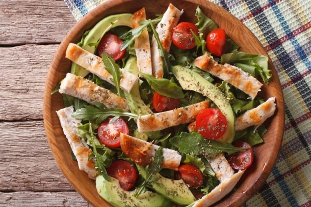 Salad with chicken, avocado and fragrant herbs