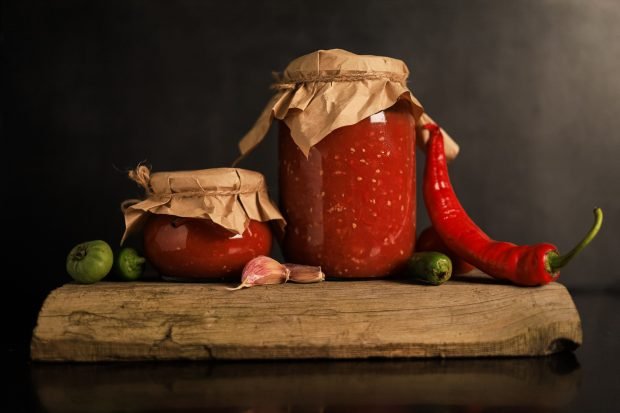 Ajika from tomatoes and garlic with sharp pepper