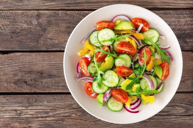 Avocado salad, tomatoes and cucumbers