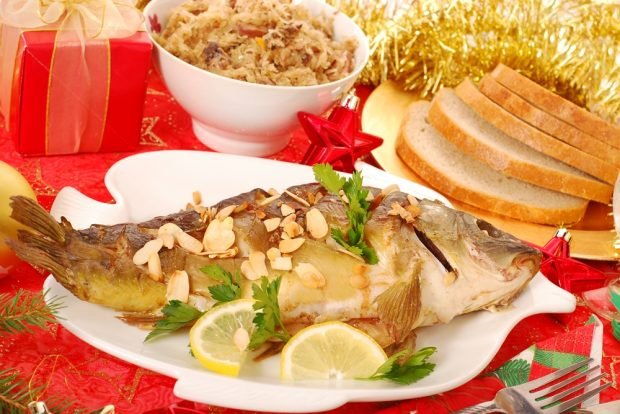 Baked carp with almond flakes