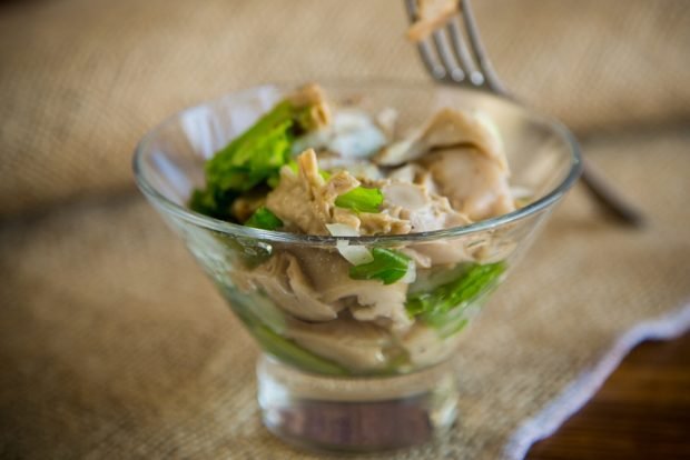 Cocktail salad with mushrooms and brass