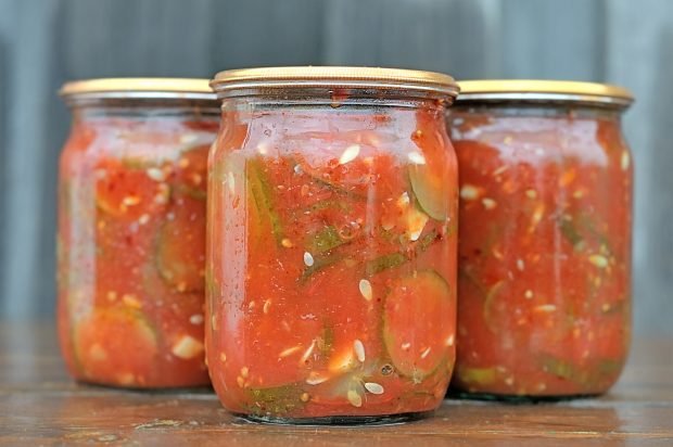 Cucumbers in tomato paste for the winter