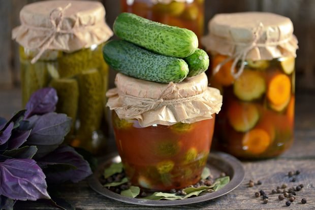 Cucumbers in tomato paste with garlic for the winter