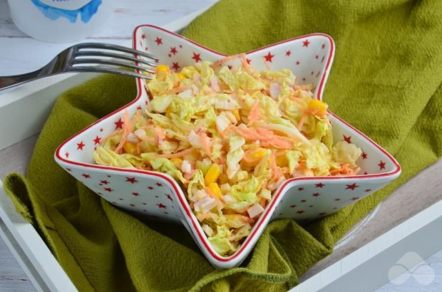 Dietary cabbage salad with carrots and crab sticks